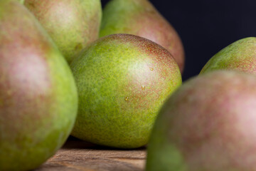 Whole ripe green pears, close up