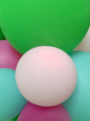 Balloons. White-green balloons. Greeting card. Festive background of balloons