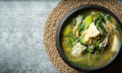 Soybean paste stew made with various vegetables and flour dough