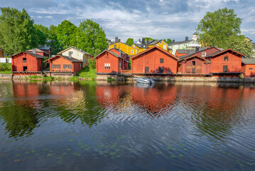 Naklejka na ściany i meble View of the river embankment of the city of Porvoo on a summer day. Finland
