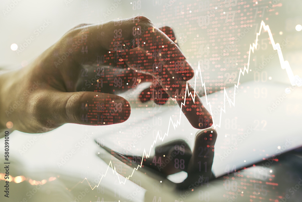 Poster multi exposure of abstract financial diagram with world map and hand working with a digital tablet o