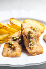 salmon fillet with garlic pesto and fried potatoes