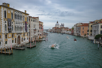 Fototapeta na wymiar Venice, Italy - 14 Nov, 2022: Basilica Santa Maria and the Grand Canal from Ponte dell'Accademia