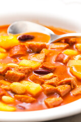 sausage goulash soup with potatoes and beans