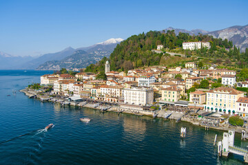 Aerial waterfront cityscape of Bellagio, one of the most picturesque towns on the shore of Lake Como. Charming location with typical Italian atmosphere. Bellagio, Italy.