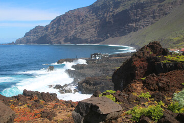 Northwest coast of El Hierro Island with cliffs and probably the smallest hotel in the world, Las...