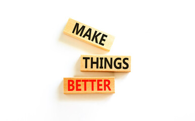 Make things better symbol. Concept words Make things better on wooden block on a beautiful white table white background. Business and make things better concept. Copy space.