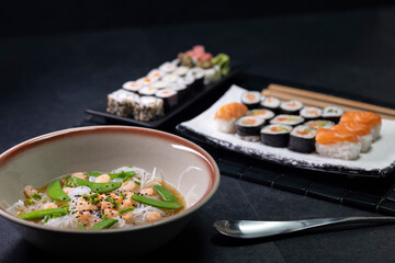 Various dishes of Asian cuisine with typical sushi