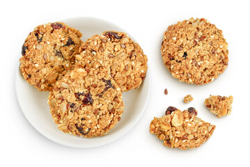 Granola cookie in ceramic bowl isolated on white background with full depth of field. Top view. Flat lay.