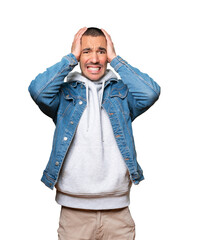 Crazy young man making a gesture of despair