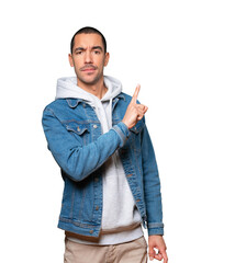 Haughty young man making a contemptuous gesture