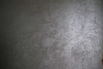 Fototapeta na wymiar wall with decorative gray paint background texture