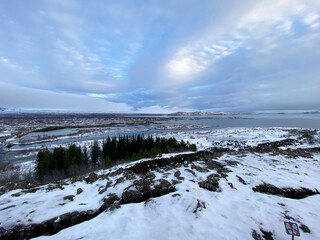 Icelandic landscape with fjord, lake and mountains in winter at Pingvellir National Park