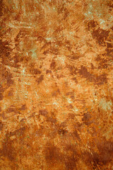 Vertical beautiful abstract texture background from an iron sheet covered with corrosion and rust.