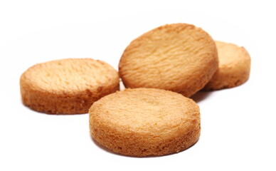 Shortbread biscuits pile, breton style, close up tea pastry with butter isolated on white