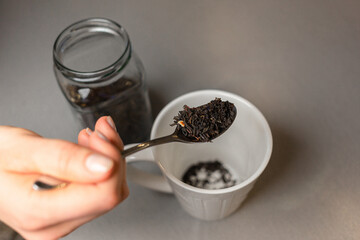 The girl is making tea