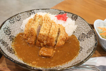Close up Japanese Curry Tonkatsu Rice or curry with pork cutlet,traditional Japanese food.