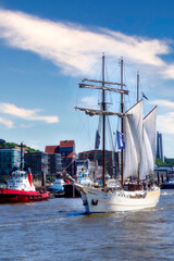 Hamburg, Germany. Sailing ship on the Elbe near Dockland.