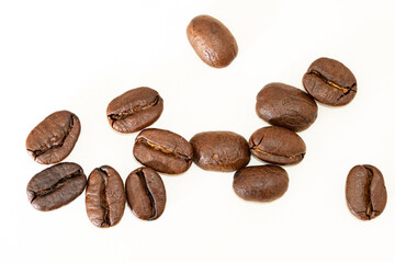Coffee beans isolated on white background, macro