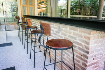 Circular metal table and chair at restaurant.