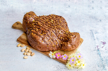 Traditional Italian Easter Dove Bread with chocolate and 
pistachio 
