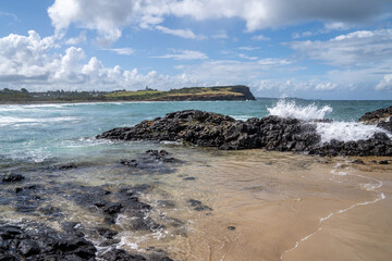 waves crashing on rocks