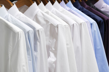 Cloth Hangers with Shirts, Closeup photo of Men, Shirts on Hangers