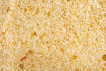 Yellow vanilla sponge biscuit cake texture. Macro shot of cake cut. Pastry dough textured background - obrazy, fototapety, plakaty