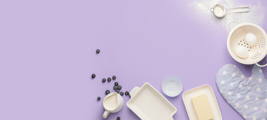 Ingredients for preparing bakery and utensils on lilac background with space for text