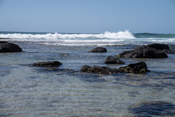 waves breaking on the rocks