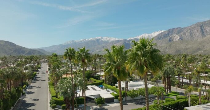 Aerial Drone view of Midcentury Houses in Palm Springs California. Aerial shot of Palm Springs California. snow capped mountains in the desert palm Springs. 