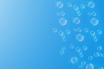 Air bubbles in the water.Hyaluronic acid or cosmetic oil drops on blue background.