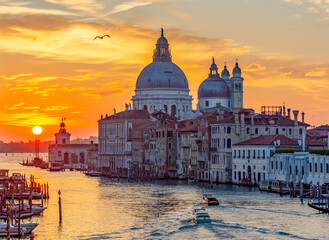 Fototapeta na wymiar Venice Grand canal and Santa Maria della Salute church at sunrise, Italy