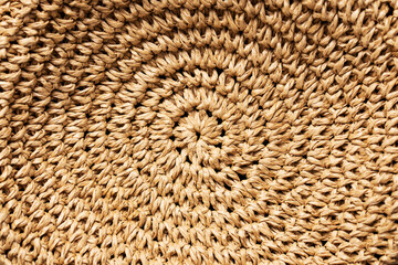 Hat texture. Round pattern. Sun style head cover. Holiday head cap. Sunlight protection background. Straw hat backdrop. Warm color wooden style beach fashion.