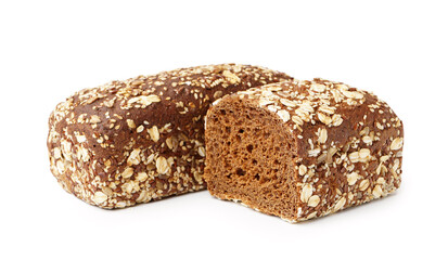 Fresh loaves of rye bread with various seeds isolated on white background