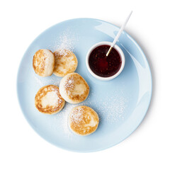 Plate with tasty cottage cheese pancakes and strawberry jam on white background