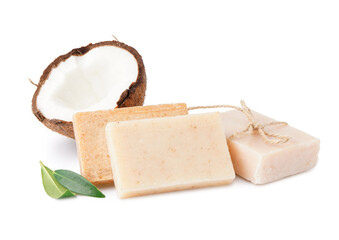 Natural soap bars and coconut on white background