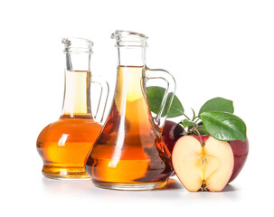 Glass bottles of fresh apple cider vinegar and fruits isolated on white background