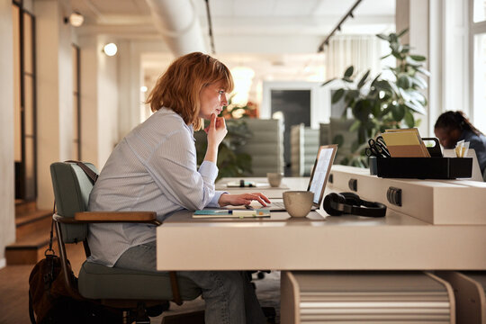 Businesswoman working online at her desk