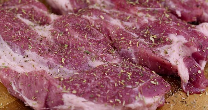 Preparation of a dish using pork meat, preparation of raw pork meat for cooking a meat dish,pork marinade using a spice mixture