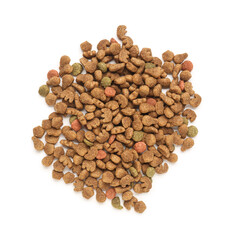 Heap of dry pet food isolated on white background
