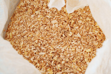sawdust and shavings in bag. material for agriculture. mulch 