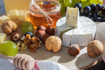 Nuts and a jar of honey, close-up