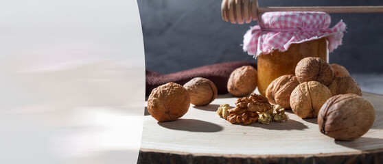 Nuts and a jar of honey, close-up