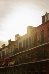 Sunset over traditional houses with balconies in the French Quarter of New Orleans