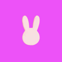 Shape of a bunny head against magenta background. Minimal concept for Easter celebration banner or card. Flat lay. Copy space