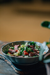 warm salad with herbs and vegetables