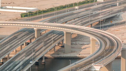 Top view city traffic on a big crossroad in Business bay timelapse.