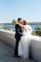 bride and groom first meeting on the roof of skyscraper