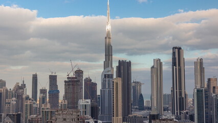 Fototapeta premium Panoramic skyline of Dubai with business bay and downtown district morning timelapse.